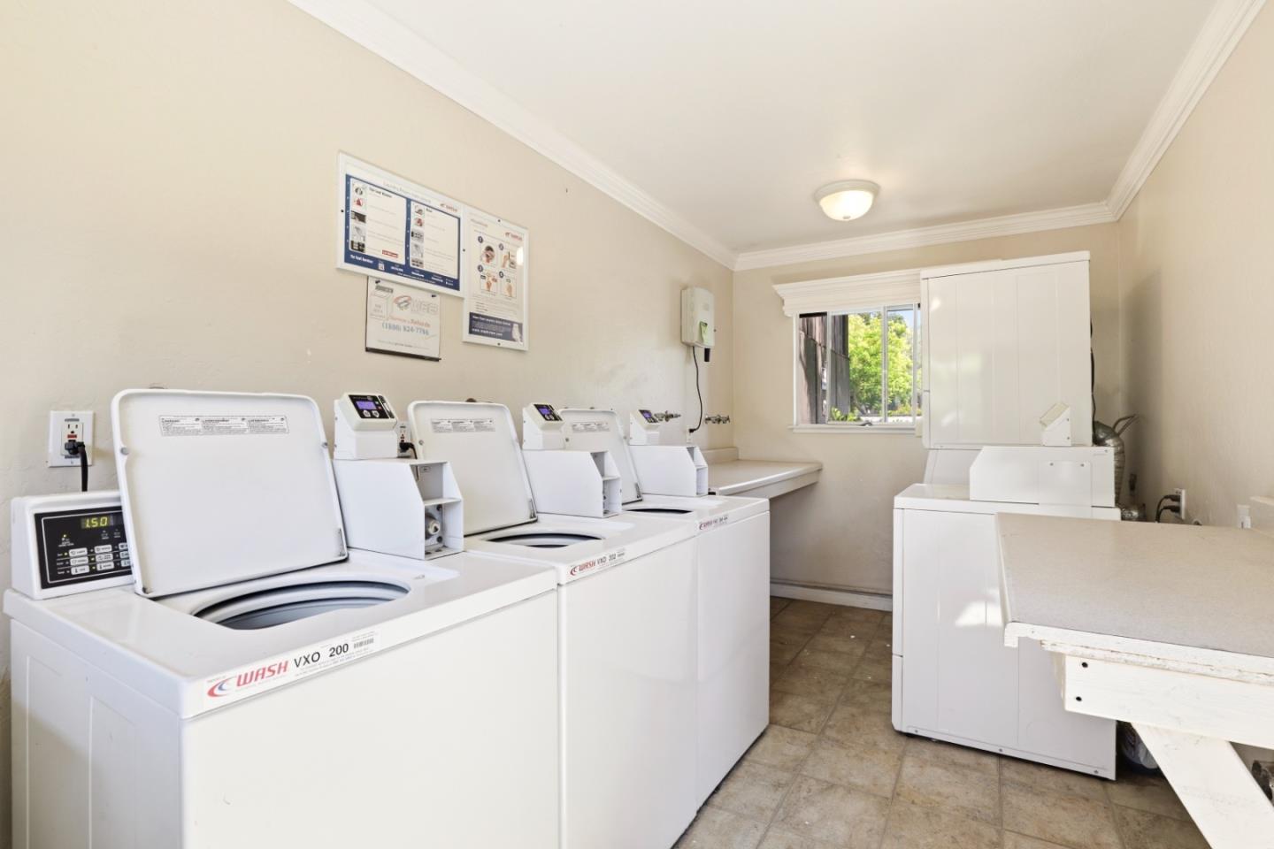 100 East Middlefield Road, Unit 3B Mountain View, CA 94043 - Photo 20 of 32 a utility room with dryer and washer