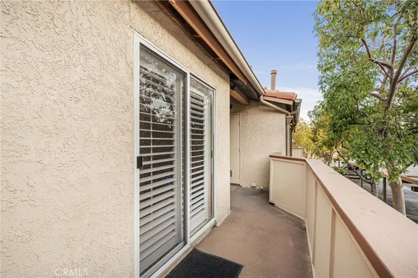 a view of a house with a white door