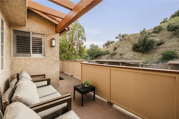 a view of a outdoor space with lounge chair