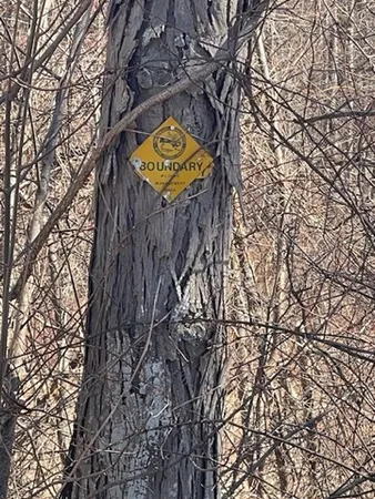 a sign that is on the side of a road