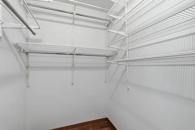 a view of a room with racks on the wall