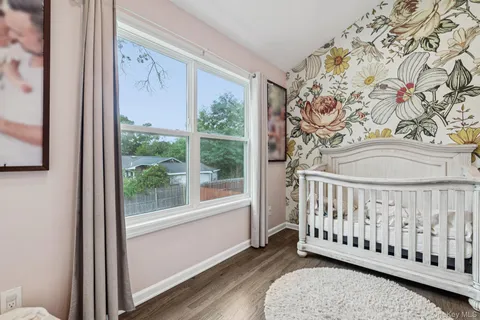 a view of a porch with a wooden floor