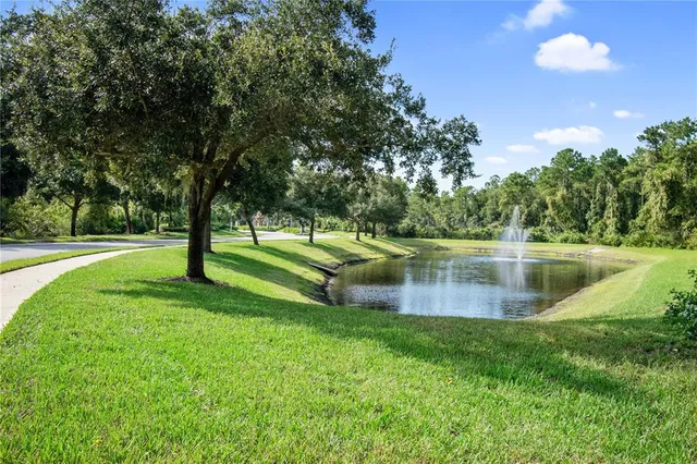 a view of a fence and a bench in the background