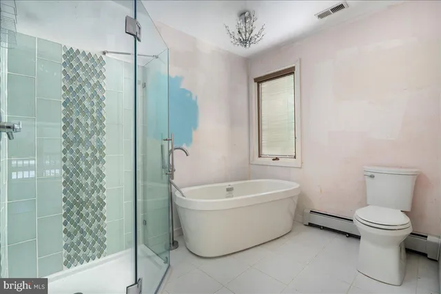 a bathroom with a bathtub