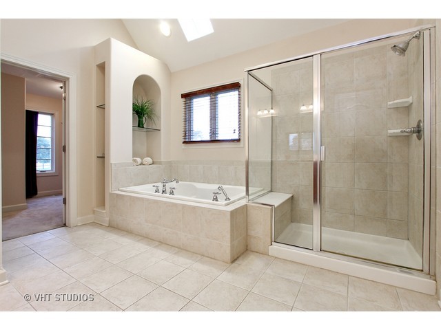 1111 Old York Road Elmhurst, IL 60126 - Photo 11 of 20 a bathroom with a bathtub and a shower