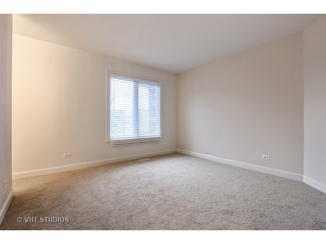 1111 Old York Road Elmhurst, IL 60126 - Photo 15 of 20 a view of an empty room with a window