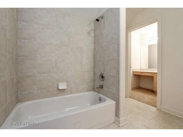 1111 Old York Road Elmhurst, IL 60126 - Photo 17 of 20 a bathroom with a tub shower and sink