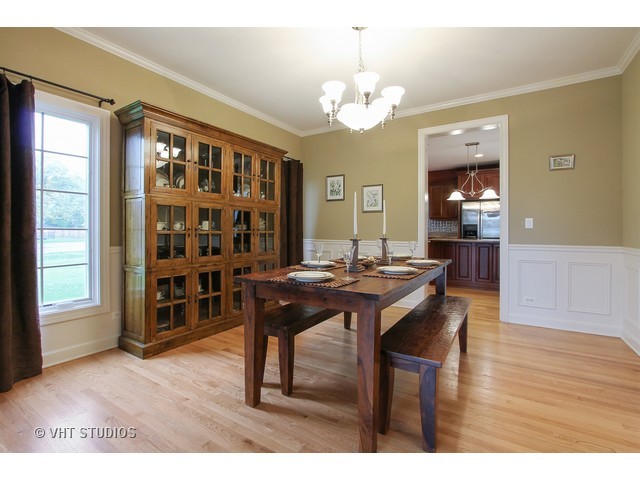 1111 Old York Road Elmhurst, IL 60126 - Photo 6 of 20 a view of a dining room with furniture and wooden floor