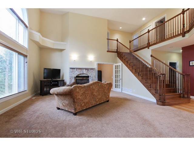 1111 Old York Road Elmhurst, IL 60126 - Photo 7 of 20 a living room with furniture and a flat screen tv