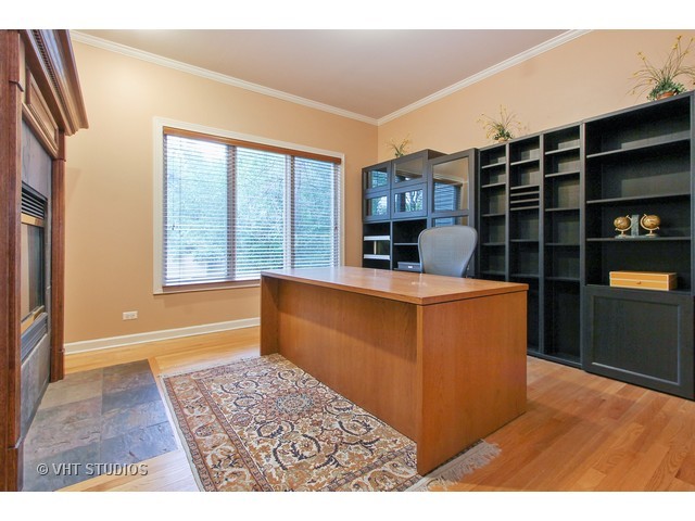 1111 Old York Road Elmhurst, IL 60126 - Photo 8 of 20 a kitchen with a refrigerator a stove and a microwave with wooden floor
