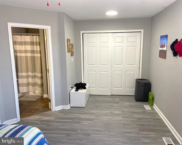 a view of livingroom with furniture and wooden floor