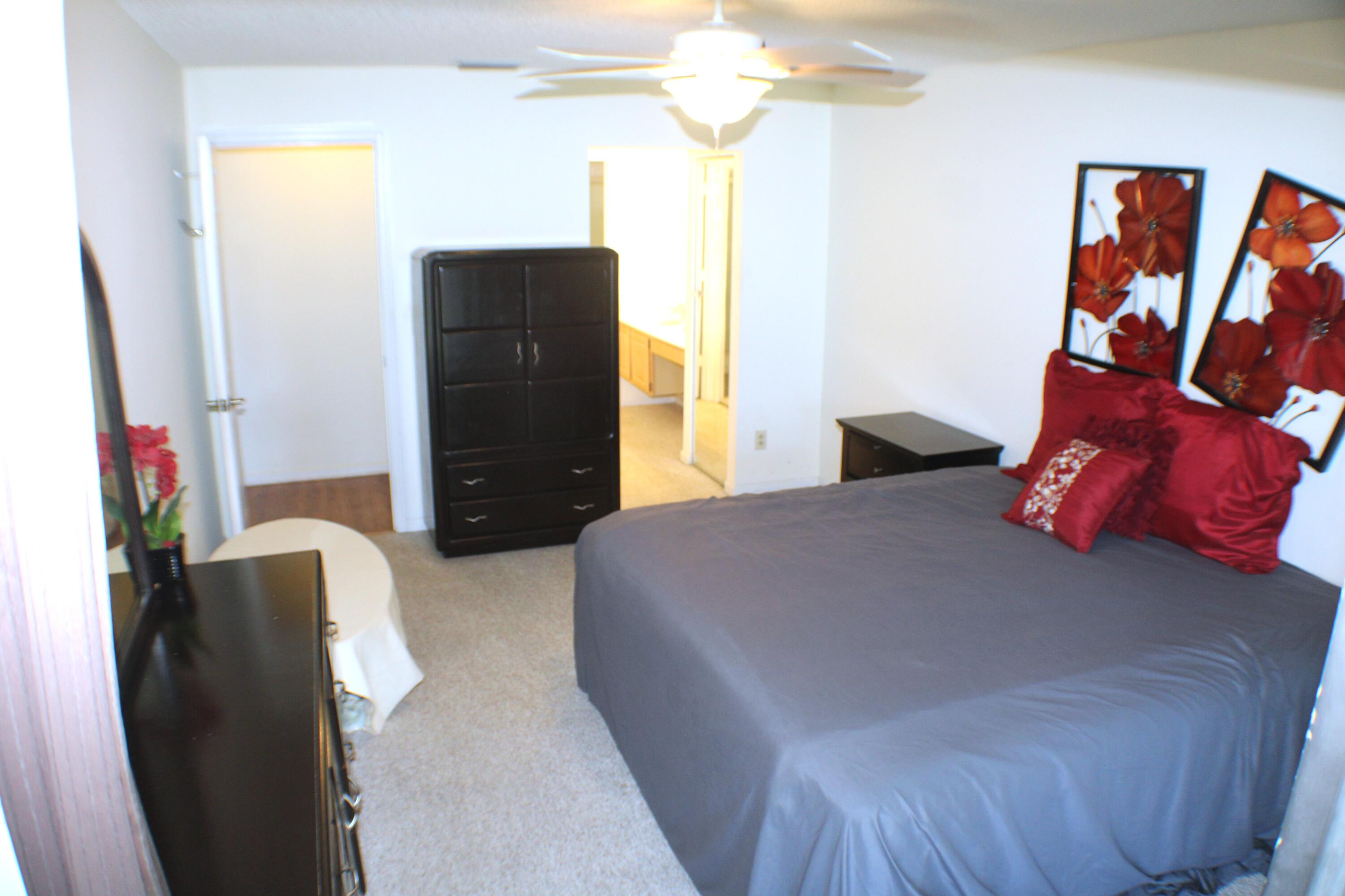1082 Keystone Drive, Unit C Jupiter, FL 33458 - Photo 11 of 26 Primary suite