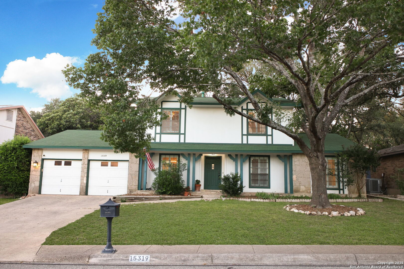 15319 Pebble Path San Antonio, TX 78232 - Photo 1 of 29 a front view of a house with a yard