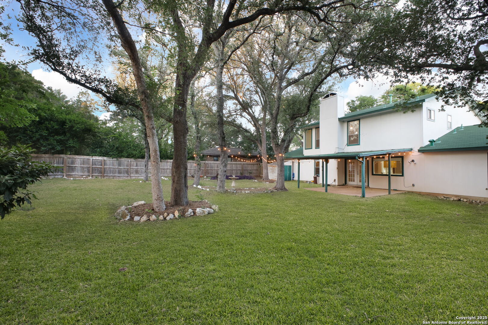 15319 Pebble Path San Antonio, TX 78232 - Photo 27 of 29 a front view of a house with garden