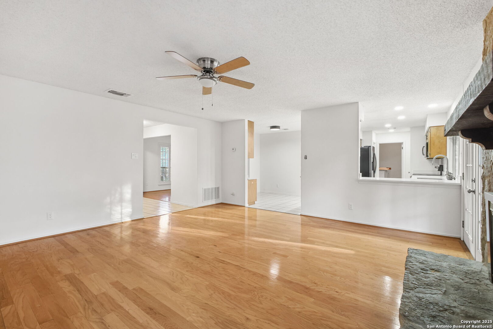 15319 Pebble Path San Antonio, TX 78232 - Photo 9 of 29 a view of an empty room with a window
