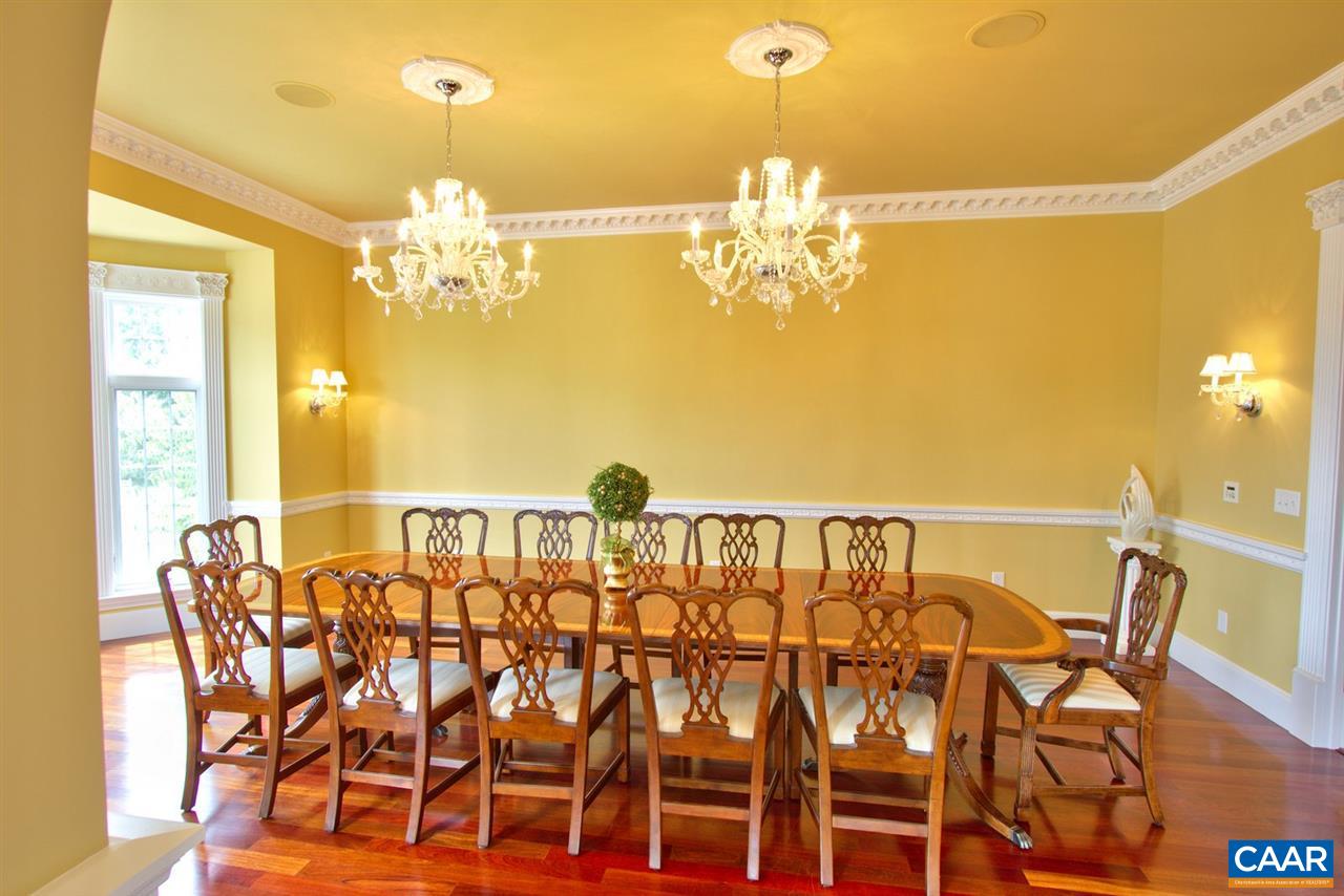 2711 Lowesville Road Roseland, VA 22967 - Photo 12 of 32 a view of a dining room with furniture and chandelier