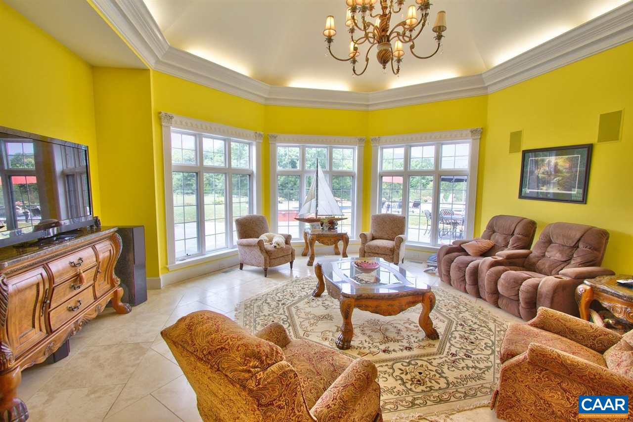 2711 Lowesville Road Roseland, VA 22967 - Photo 8 of 32 a living room with furniture and a large window