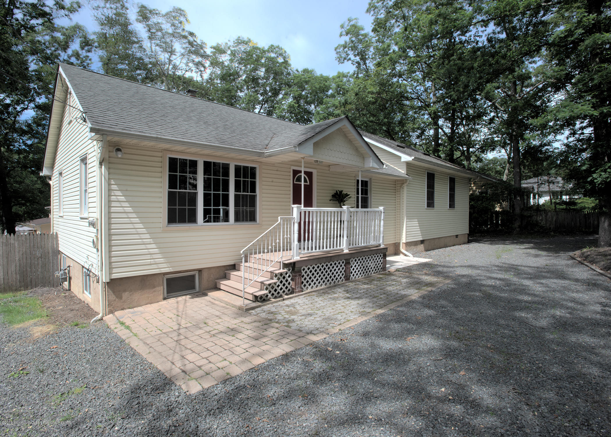 802 West Farms Road Howell, NJ 07731 - Photo 1 of 16 a view of a house with a yard and garage