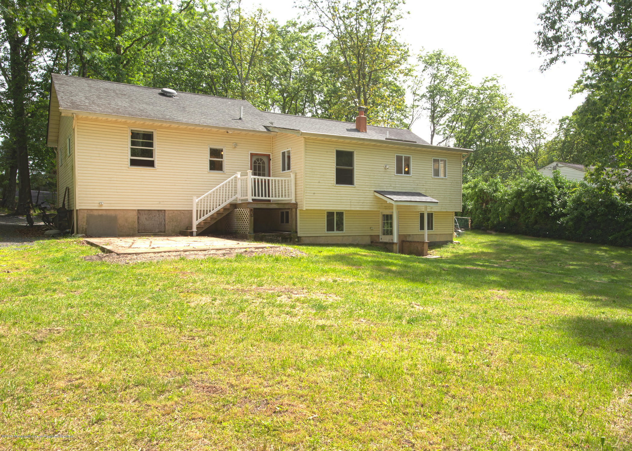 802 West Farms Road Howell, NJ 07731 - Photo 16 of 16 a house view with swimming pool in front of it