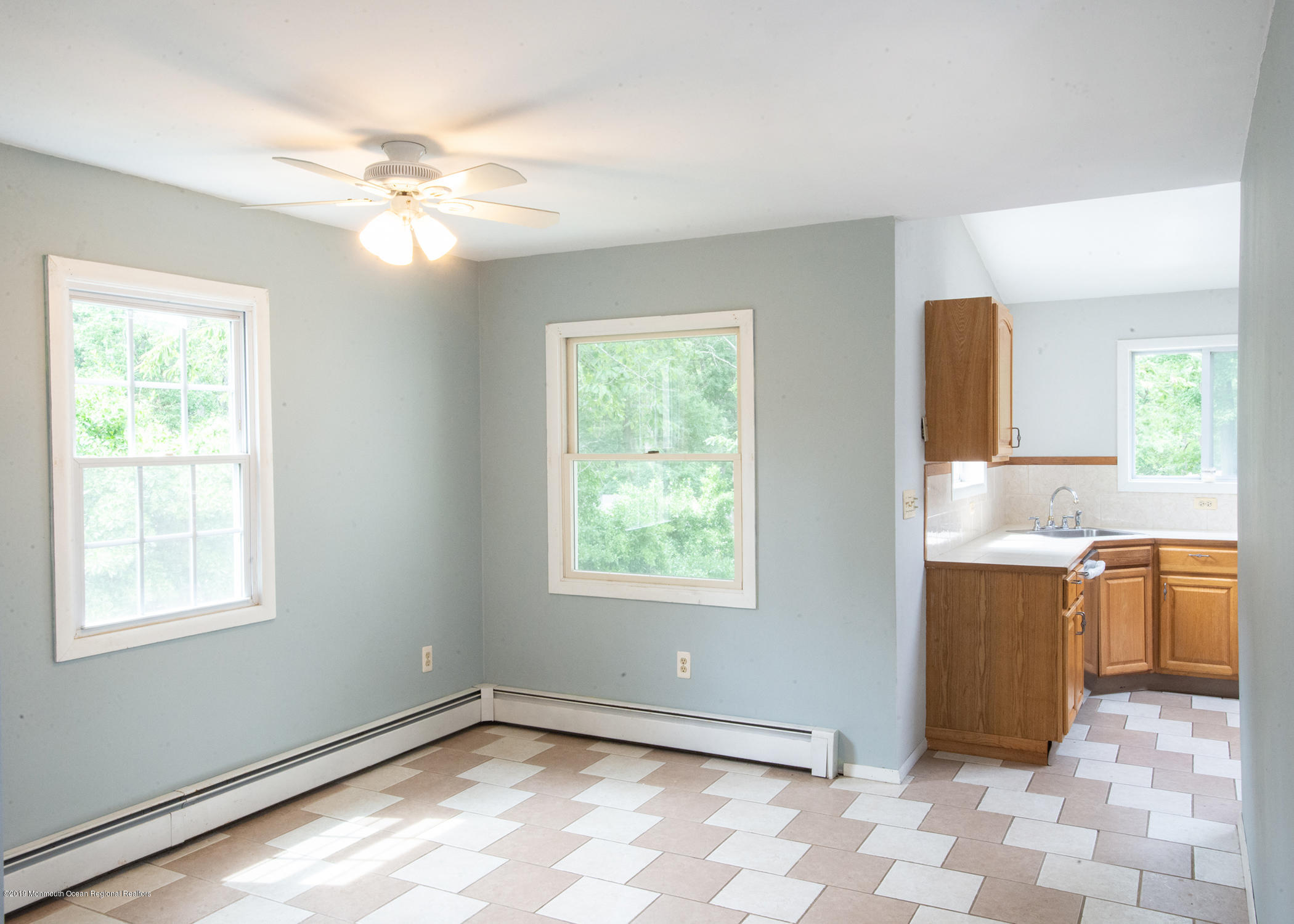 802 West Farms Road Howell, NJ 07731 - Photo 3 of 16 a view of a kitchen and a window