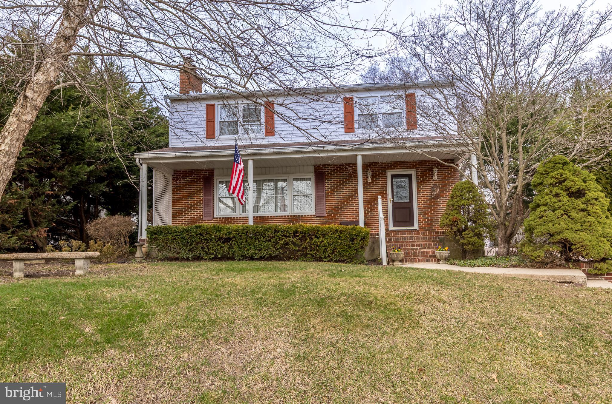 4300 Camellia Road Nottingham, MD 21236 - Photo 2 of 47 a view of a brick house with a yard