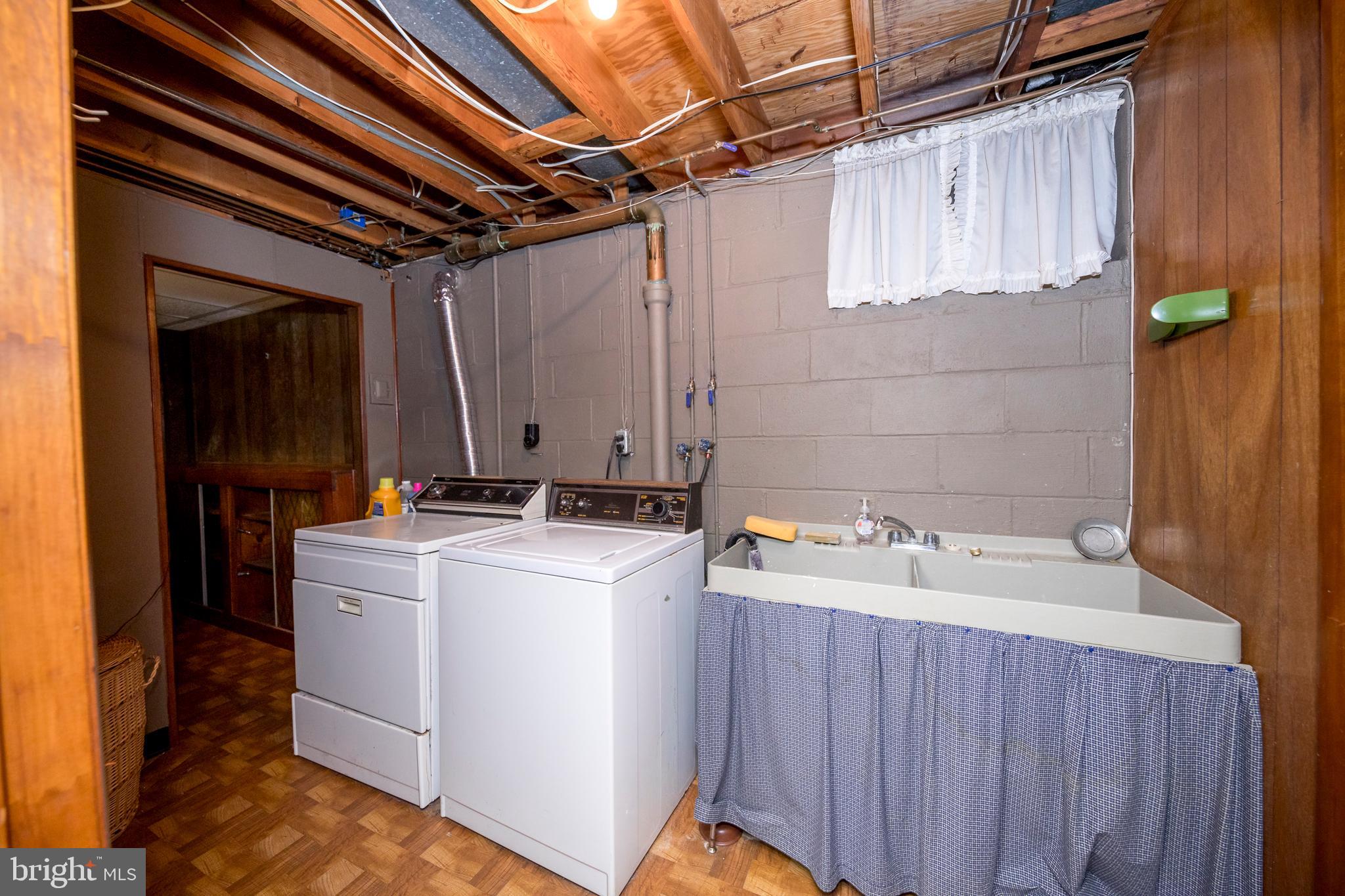4300 Camellia Road Nottingham, MD 21236 - Photo 40 of 47 a utility room with dryer and washer