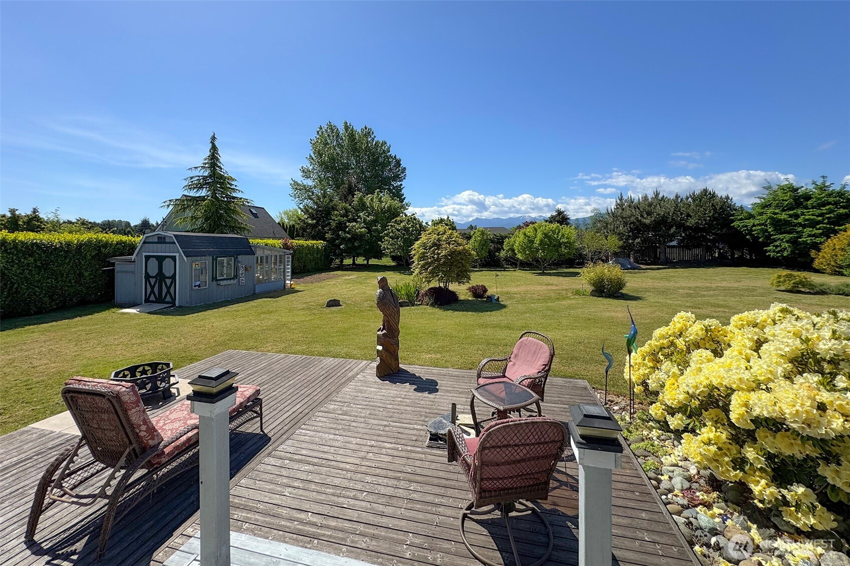 101 Timothy Lane Sequim, WA 98382 - Photo 14 of 39 a view of a lake with a patio