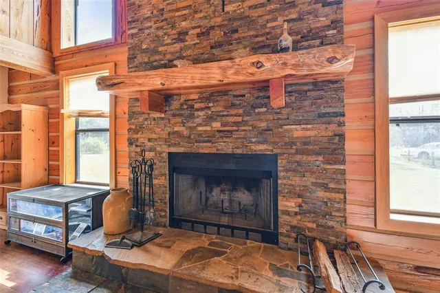 a view of livingroom with furniture wooden floor and windows