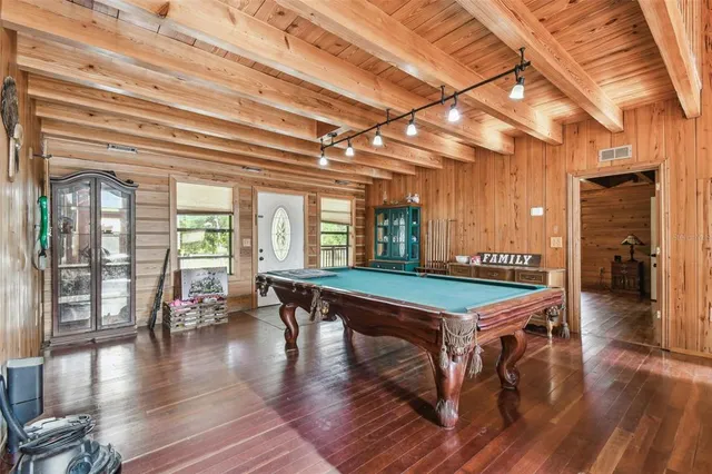 a view of wooden floor in an empty room