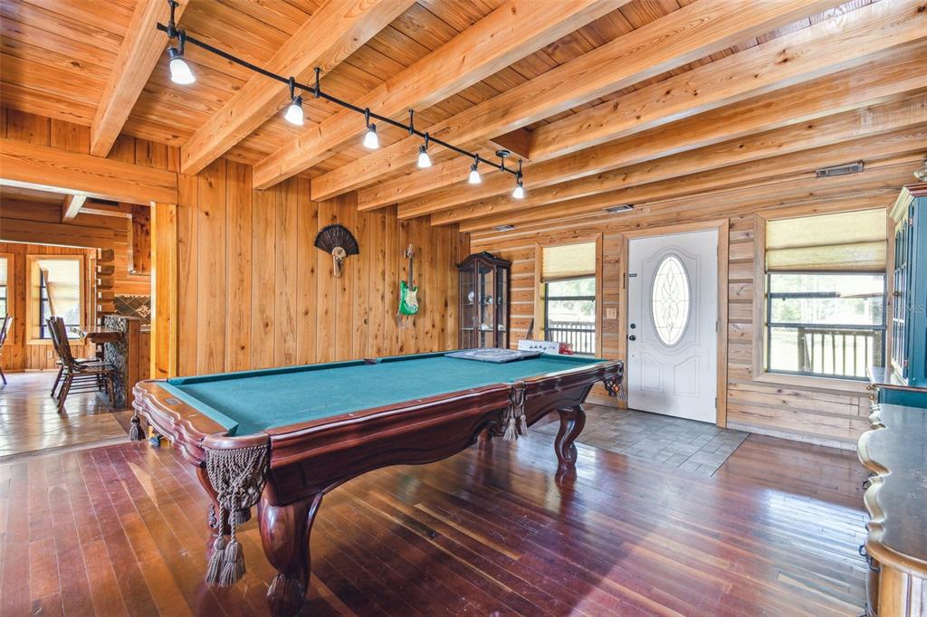 19708 Bower Road Dade City, FL 33523 - Photo 24 of 84 a room with wooden floors and pool table