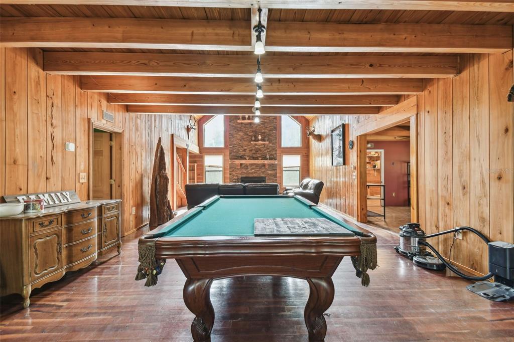19708 Bower Road Dade City, FL 33523 - Photo 25 of 84 a room with pool table and windows