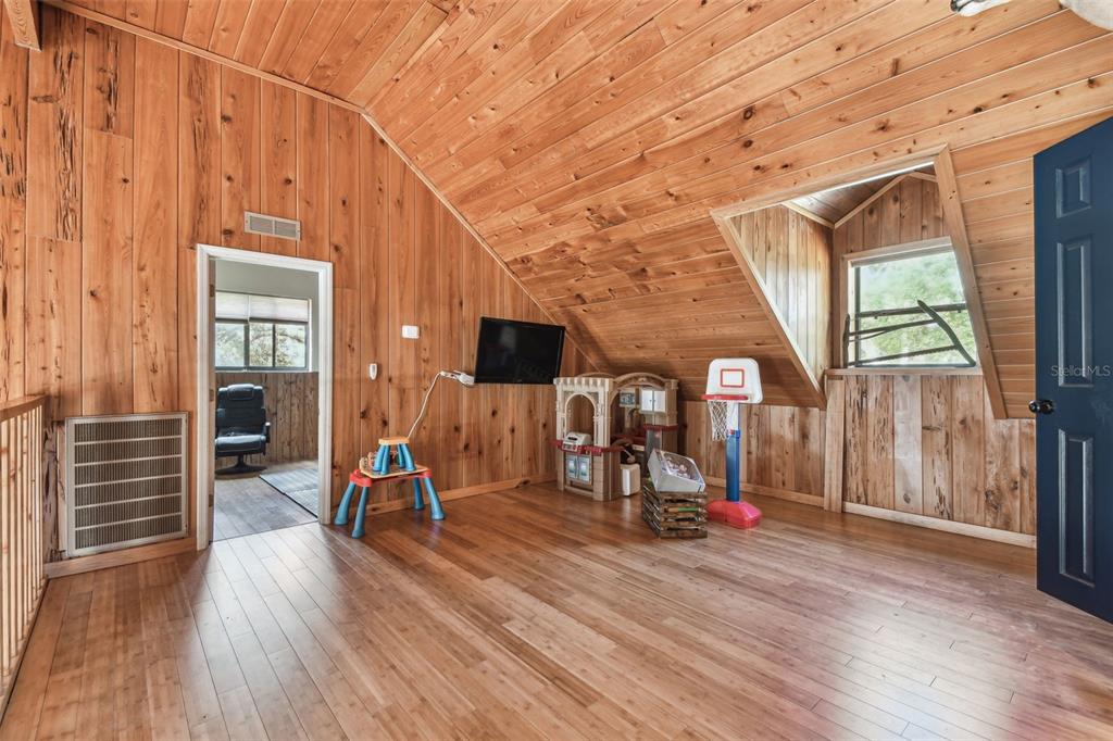 19708 Bower Road Dade City, FL 33523 - Photo 35 of 84 a view of a room with wooden floor