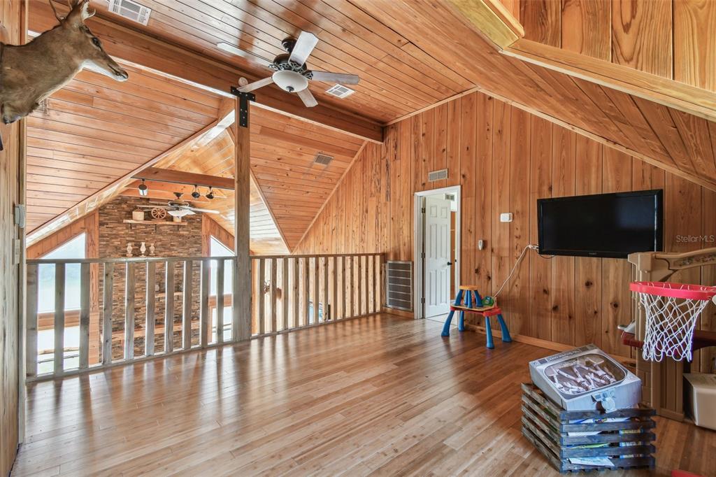 19708 Bower Road Dade City, FL 33523 - Photo 36 of 84 a view of livingroom with furniture wooden floor and windows
