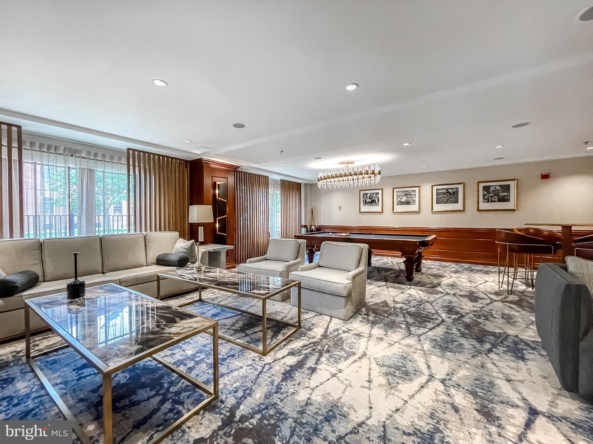 801 Key Highway, Unit 413 Baltimore, MD 21230 - Photo 53 of 58 a living room with furniture and a flat screen tv