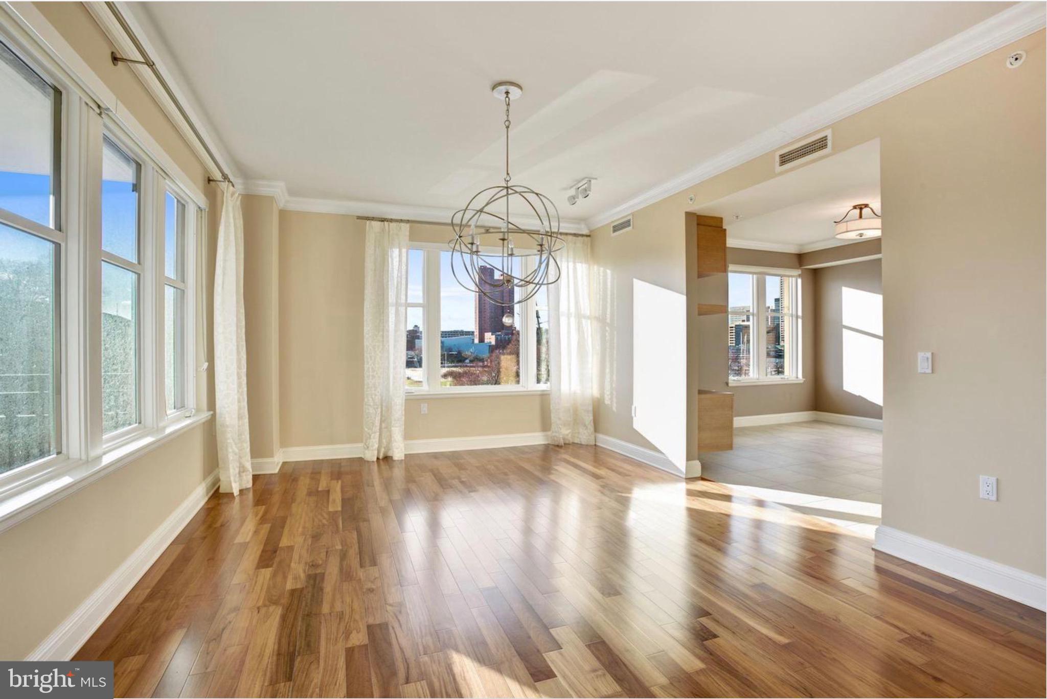 801 Key Highway, Unit 413 Baltimore, MD 21230 - Photo 6 of 58 a view of gallery with wooden floor