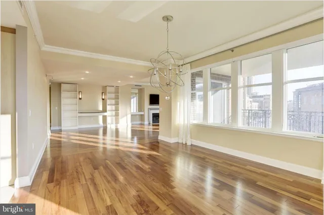 a view of a large kitchen with a large window