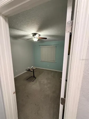 a view of a livingroom with a staircase