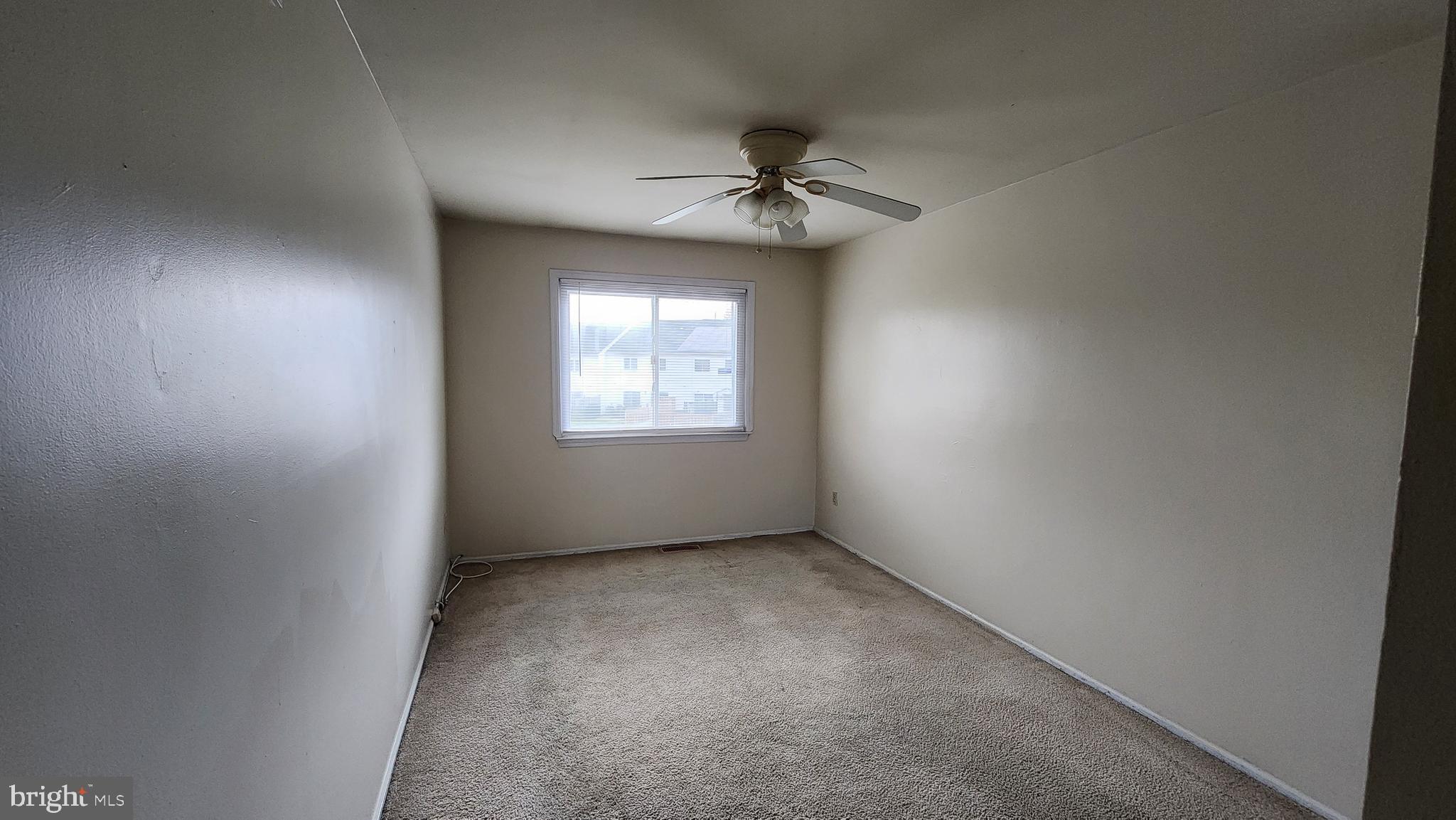 4 Nutmeg Drive Lumberton, NJ 08048 - Photo 11 of 18 an empty room with a window and a fan