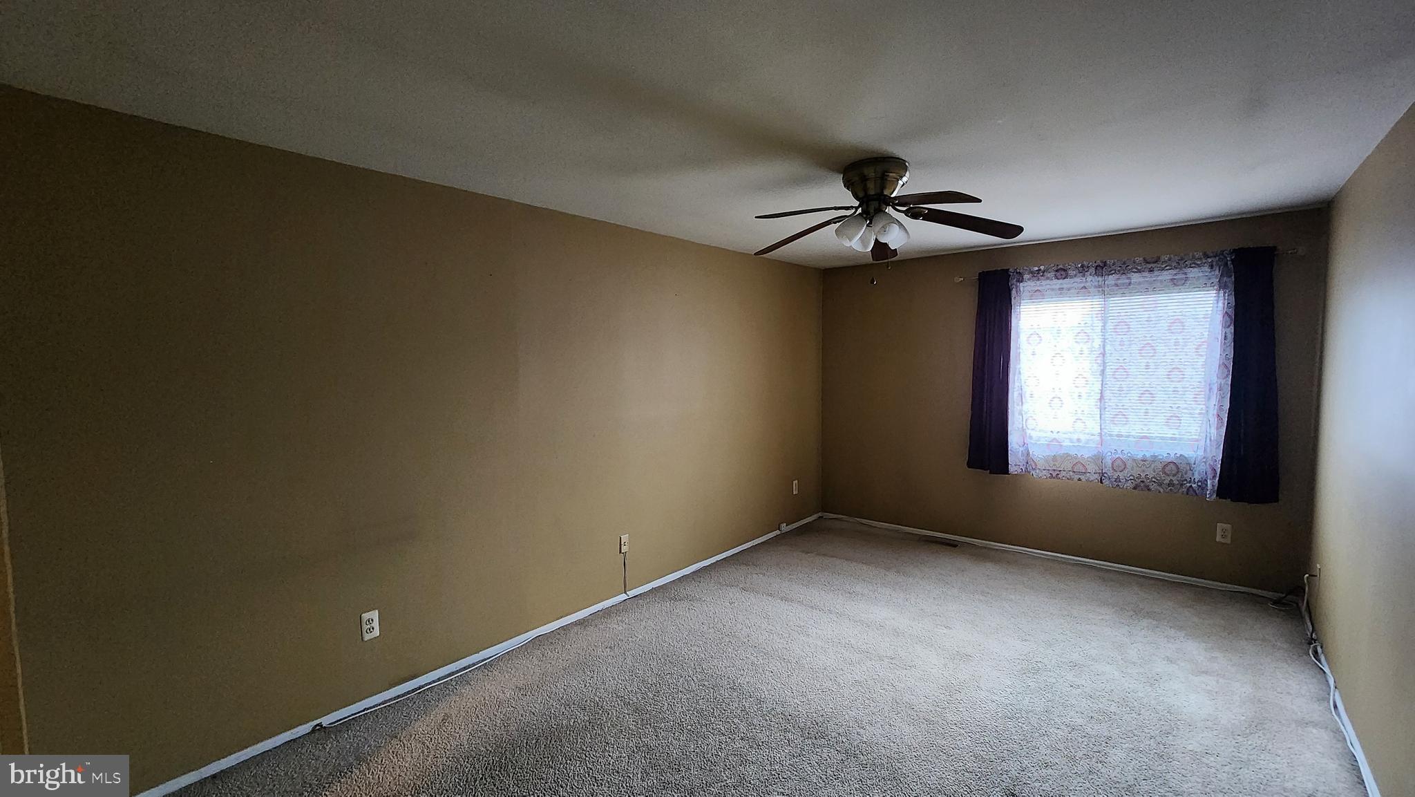 4 Nutmeg Drive Lumberton, NJ 08048 - Photo 16 of 18 a view of a livingroom with a ceiling fan and window