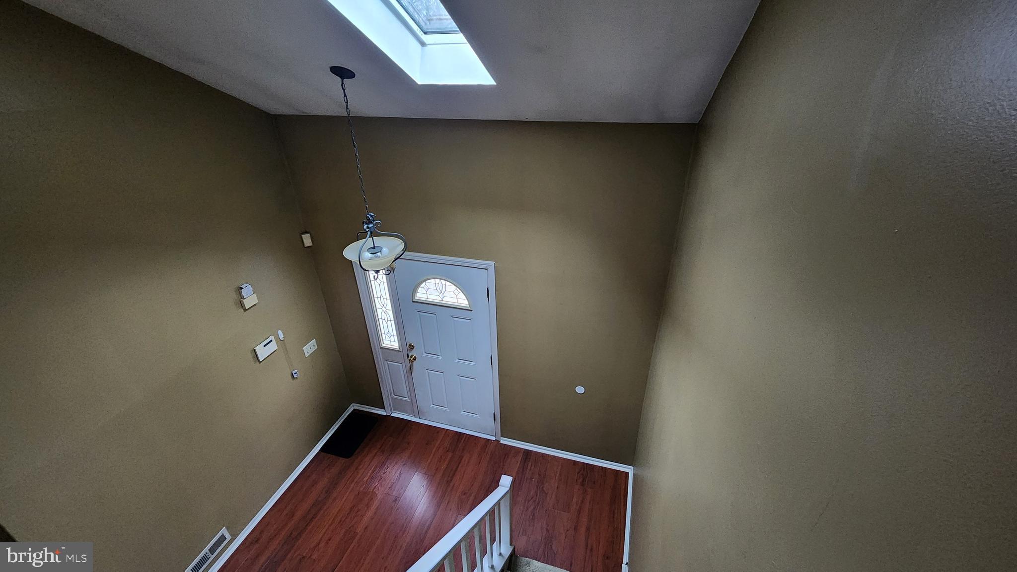 4 Nutmeg Drive Lumberton, NJ 08048 - Photo 3 of 18 a view of an empty room with wooden floor