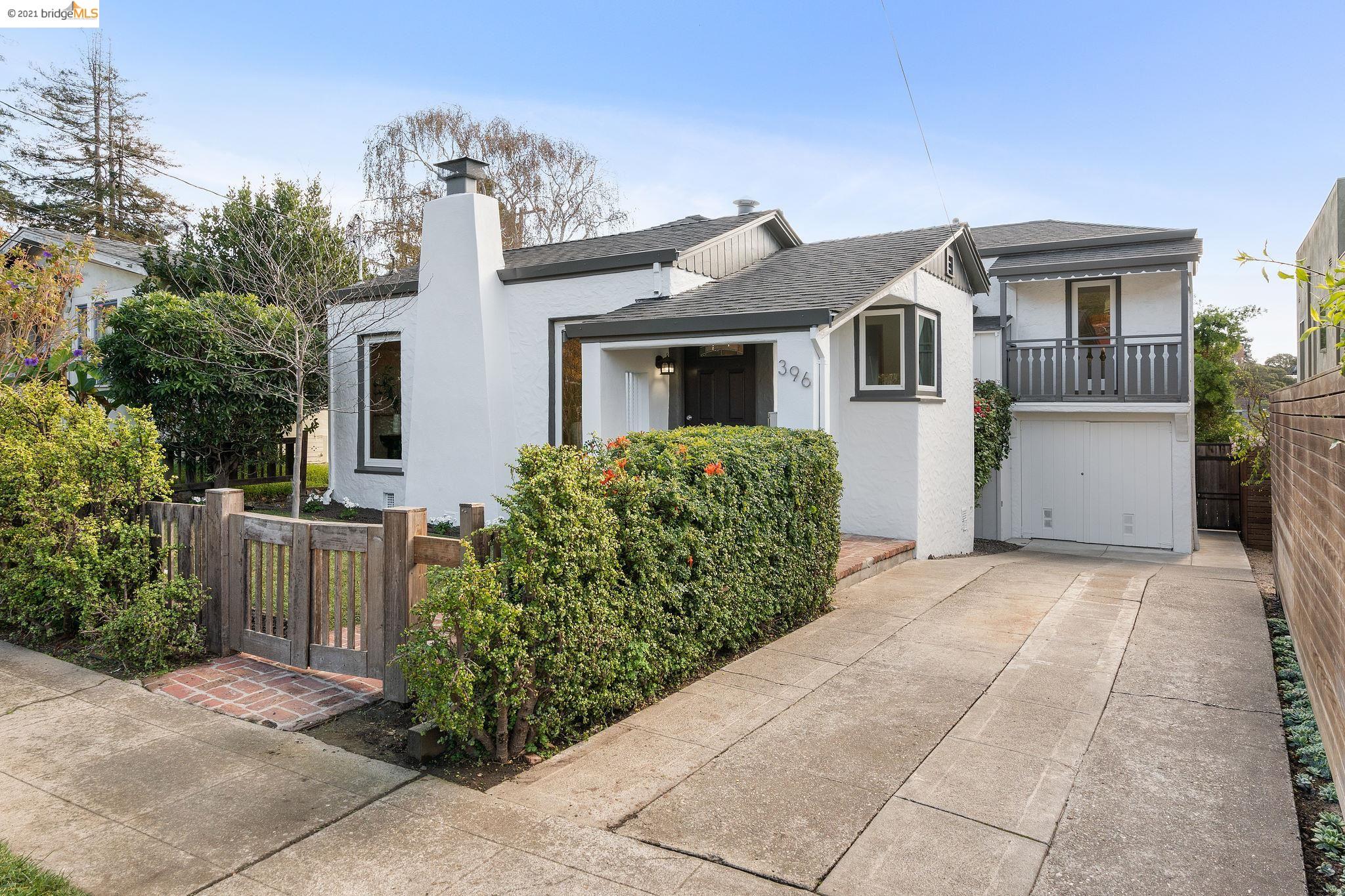396 Coventry Road Kensington, CA 94707 - Photo 1 of 1 a front view of a house with a garden