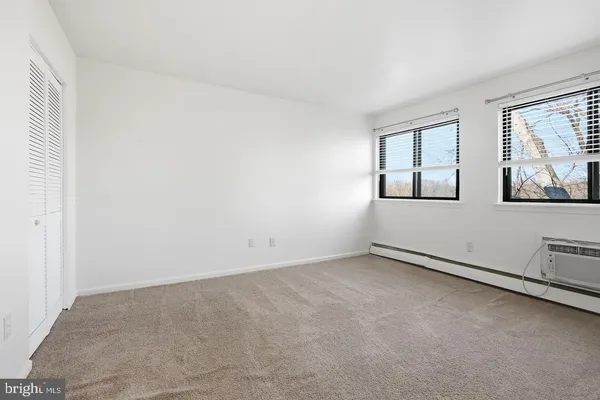 an empty room with windows