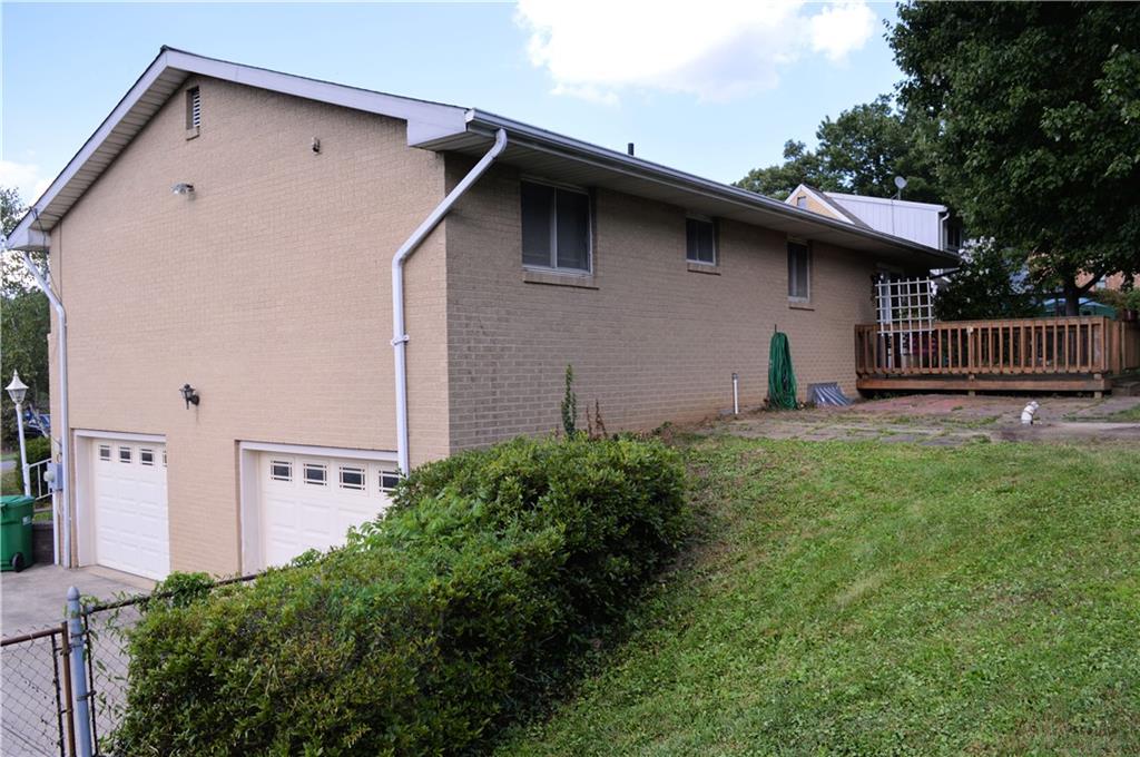 130 Hampton Court Butler, PA 16002 - Photo 20 of 22 a backyard of a house with lots of green space