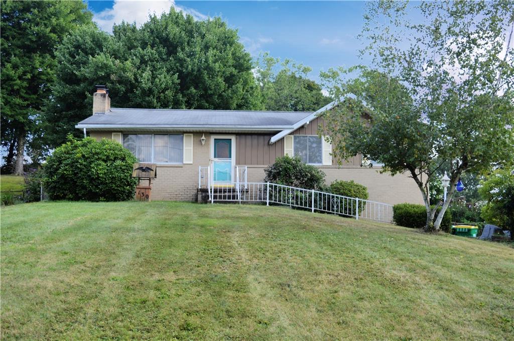 130 Hampton Court Butler, PA 16002 - Photo 2 of 22 a house with trees in the background