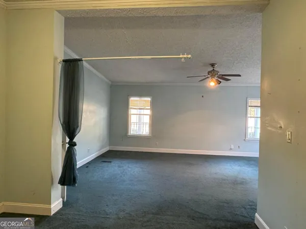 a view of lake with mountain in the background