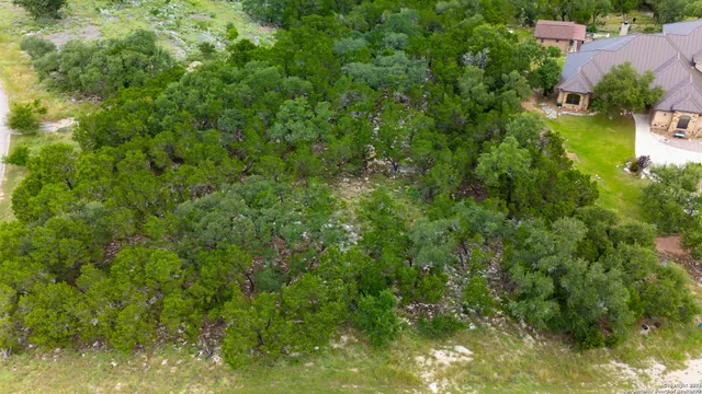 a view of a house with a street