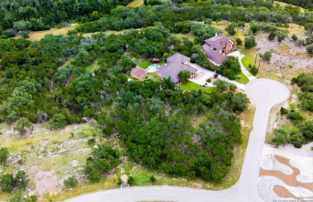 a view of a lake with a building in the background