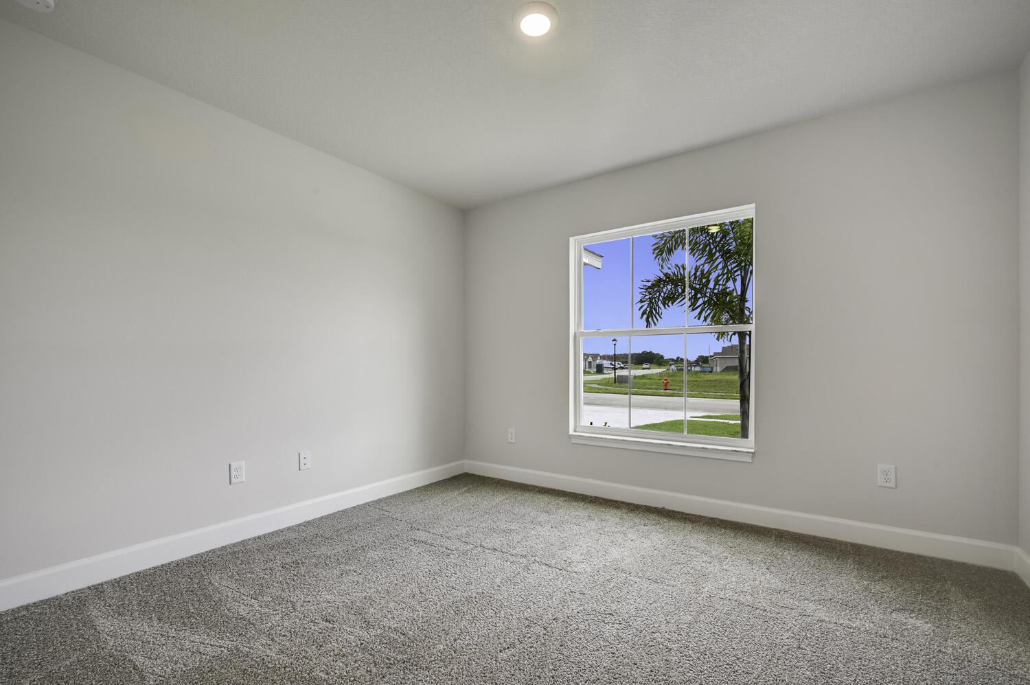 8623 Giovanni Avenue Fort Pierce, FL 34951 - Photo 12 of 28 an empty room with windows