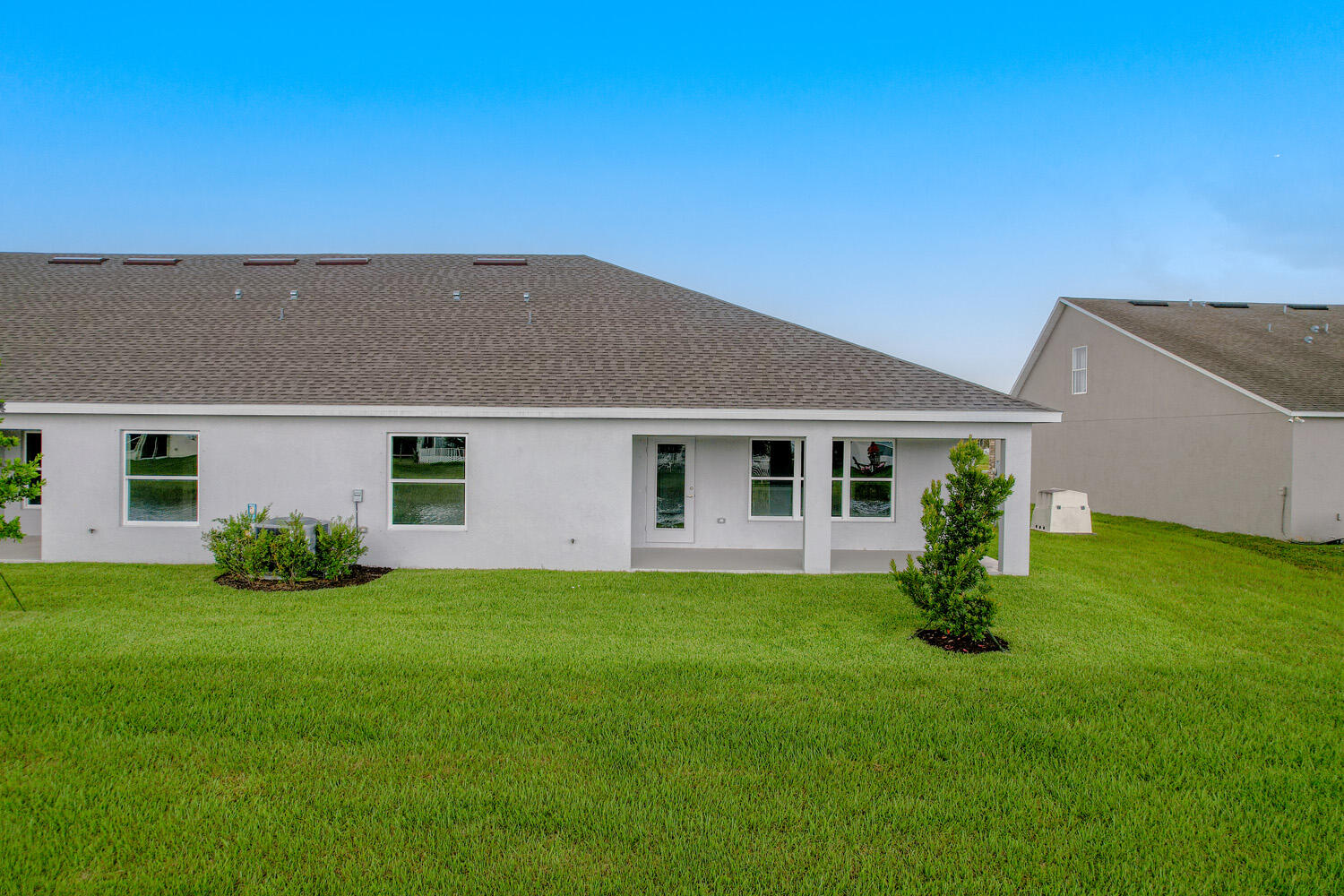 8623 Giovanni Avenue Fort Pierce, FL 34951 - Photo 18 of 28 a view of a house with a yard
