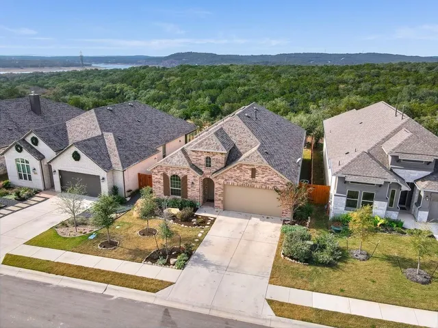 an aerial view of a house with a garden